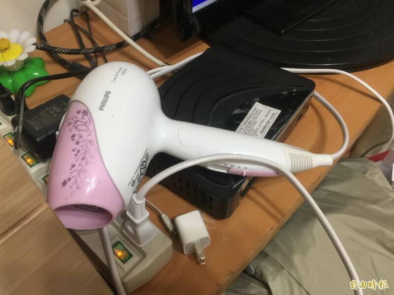 高等法院认为，光有照片也不知道什么时候拍的，二审逆转判妻败诉。吹风机示意图。（资料照）